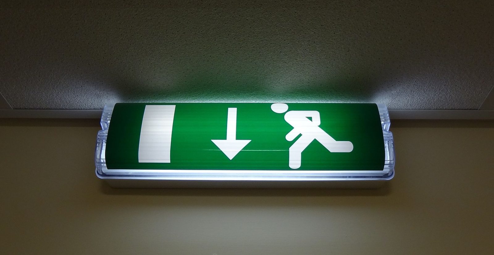 Illuminated emergency exit sign